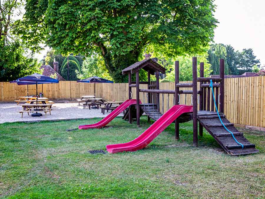 The childrens play area at the Crown Inn Cholderton. Sit and relax with a drink and a meal while you watch your children play.