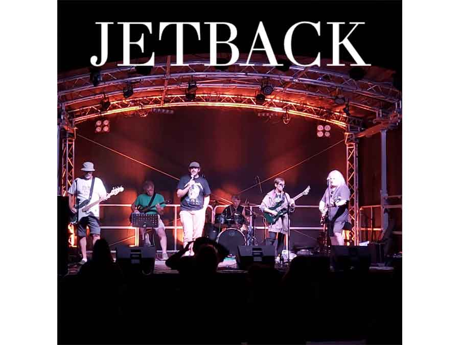 Jetback  on stage, one of the headline bands at the Crown Festival at Cholderton 29th July 2023 tickets available online now