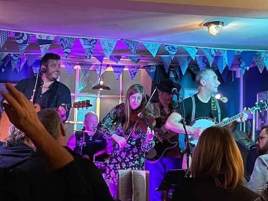 Splat the Rat, a 5 piece collective playing songs of old, the traditional folk and giving them a modern day going over, appearing at the Crown Festival at Cholderton 29th July 2023